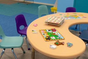 A table setup for ABA Therapy sessions at Ally Behavior's Springfield ABA Center.